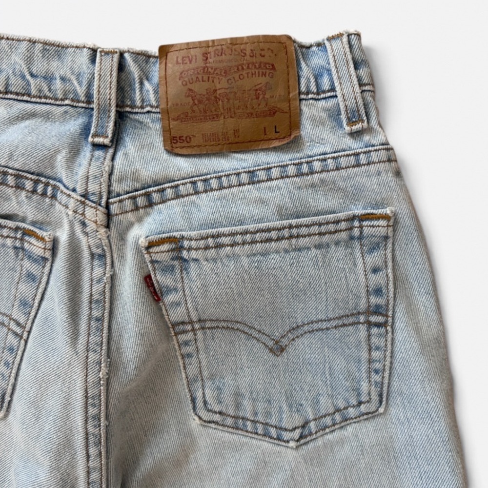 Vintage Levis 550 Relaxed Tapered Jeans 90s Light Wash Made in USA Size 7 JR L